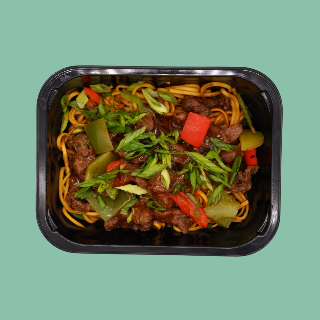 seared beef and black bean noodle dish in ready meal container